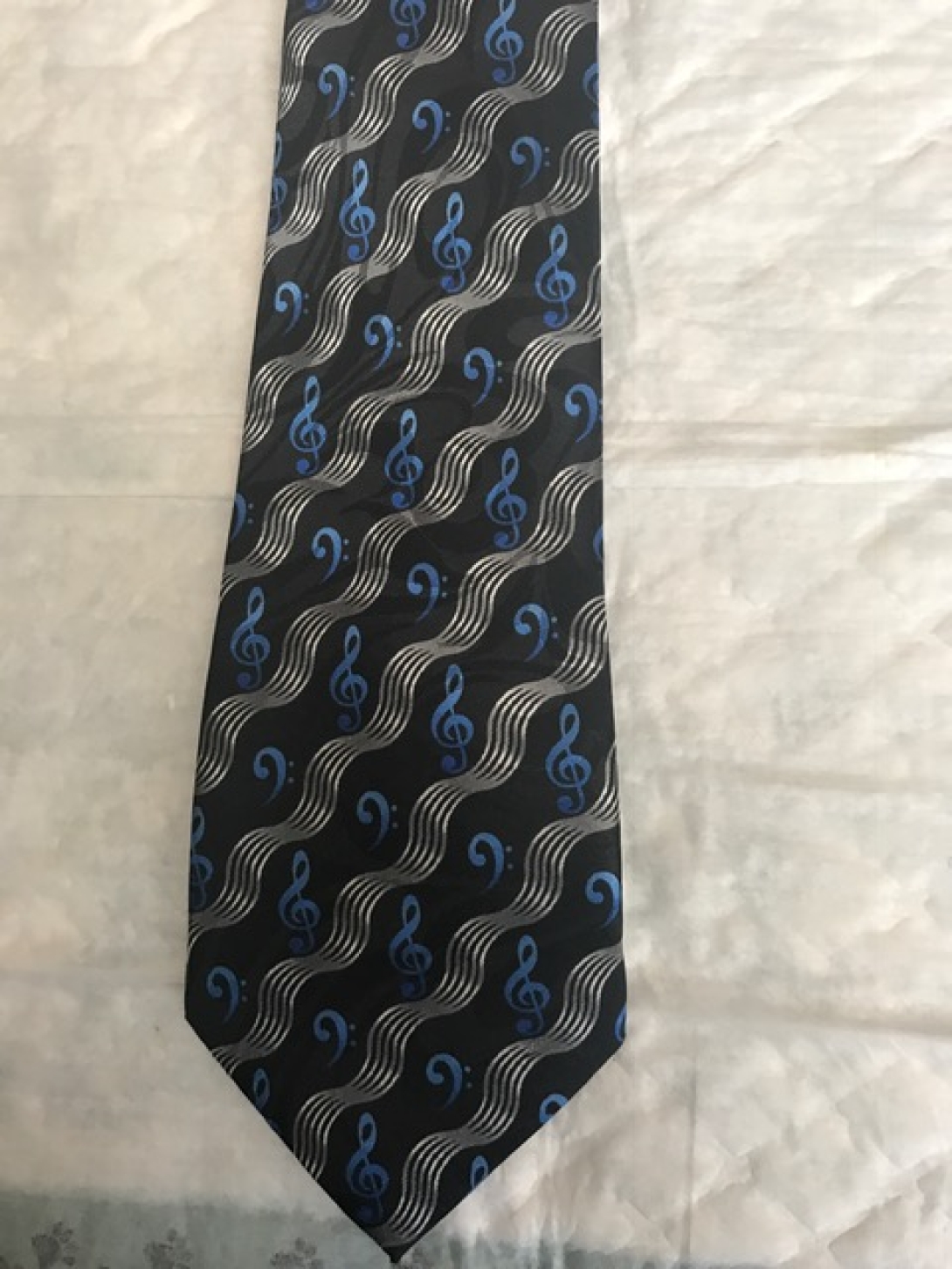 Treble and Bass Cleff with Waves Tie